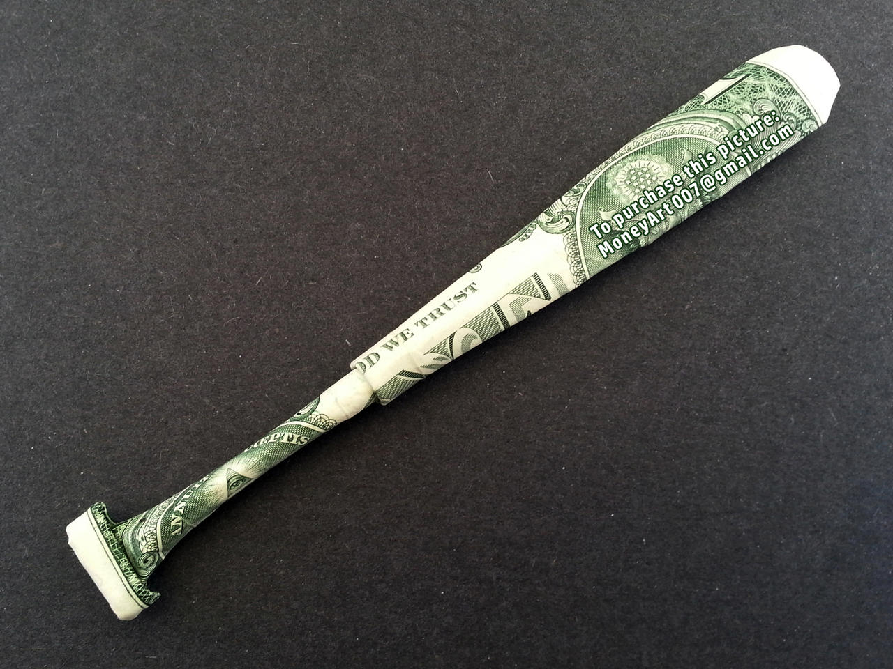 How to Fold a Dollar Bill into a Baseball Bat